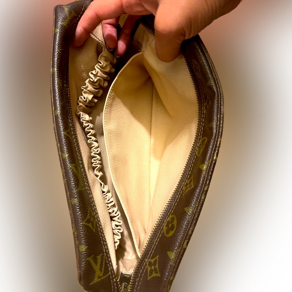 LV Trousse toiletries bag